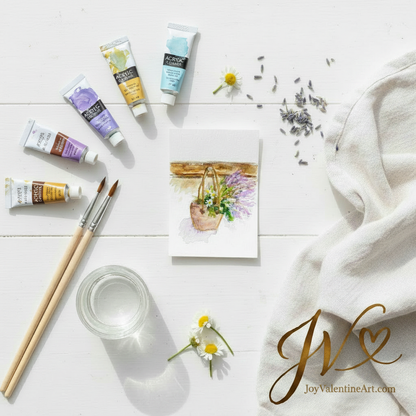 A Little Basket of Joy original acrylic ACEO painting flat lay with acrylic paint tubes, brushes, daisies, and lavender by Joy Valentine