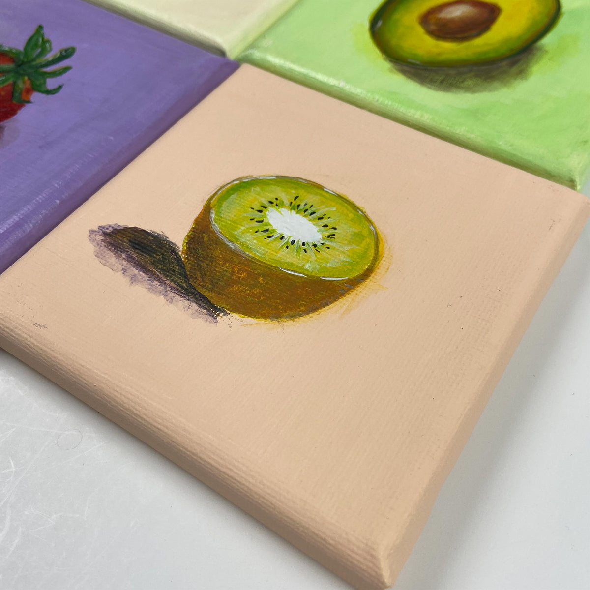 Mini Painting Kiwi original acrylic painting angled lay flat by Joy Valentine